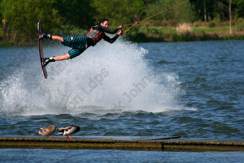 IMG 4988 
 Keywords: Mark Johnson, images, digital images, UK, GB, Great Britain, water sports, surfing, sommersault, acrobatics, swimming, knee boarding, surf, spray, lake, splash