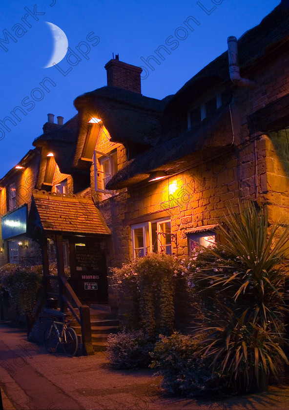 A3 MG 2848 
 Pub was taken late one evening with a tripod, the moon was added later with psp Cs v 8.0 
 Keywords: (Multiple values) traditional british pub fox and hounds althorpe coaching inn brington night lights pub lit moon pub
